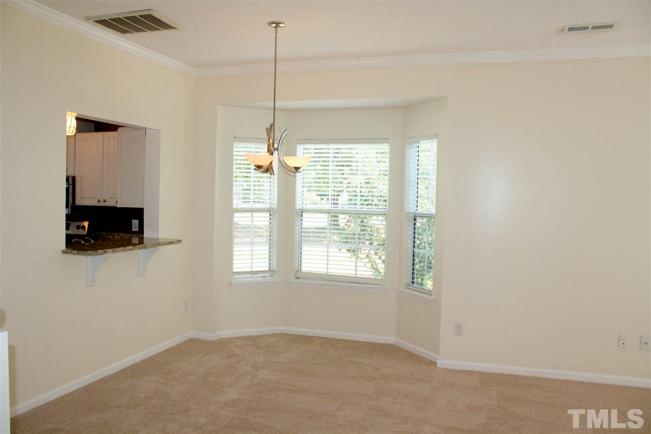 4435 Still Pines Drive Raleigh, NC 27613 - Photo 8 of 19 a view of an empty room with a window