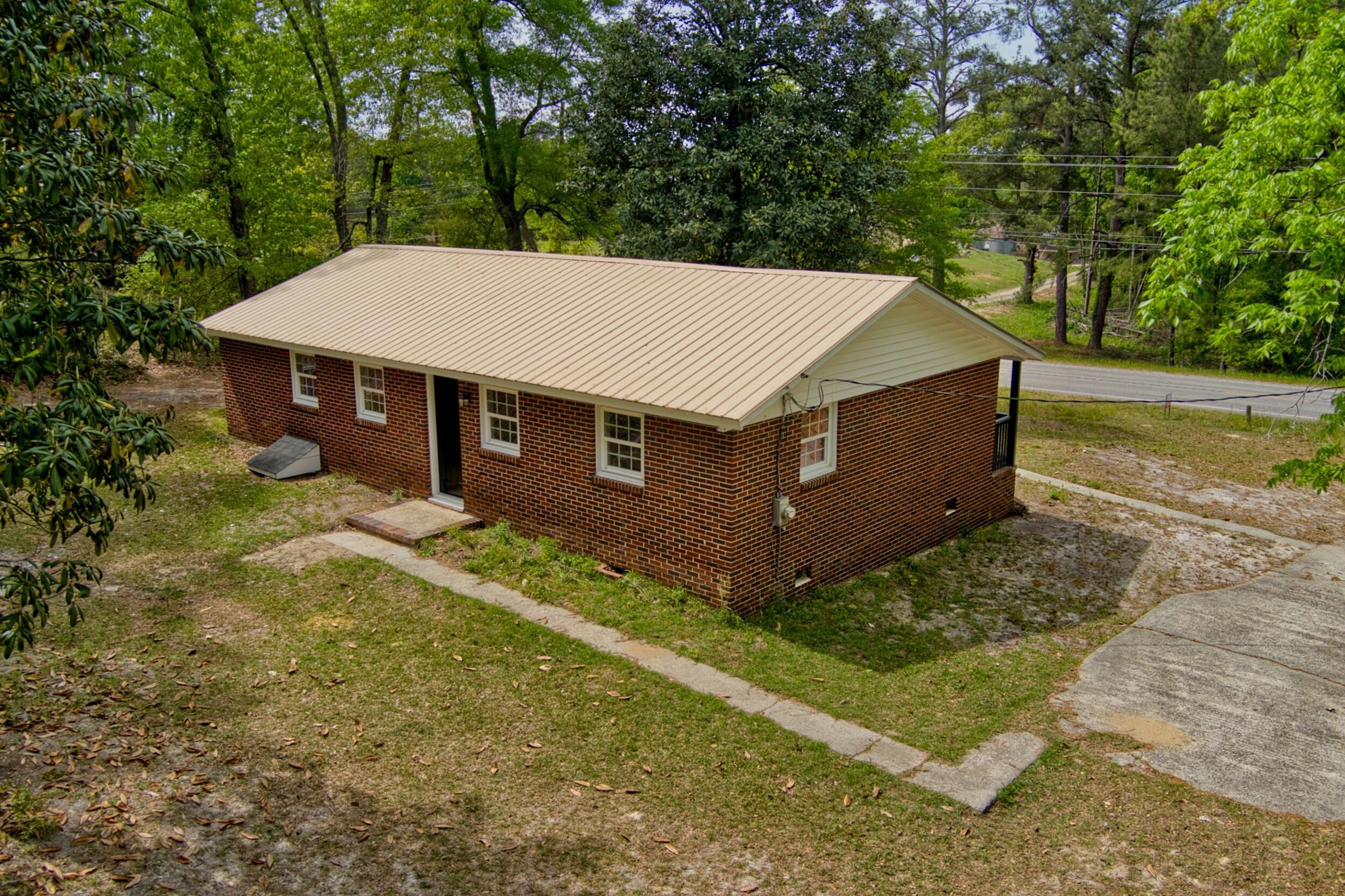 3016 Wagener Road Aiken, SC 29801 - Photo 27 of 29 a view of a house with a yard