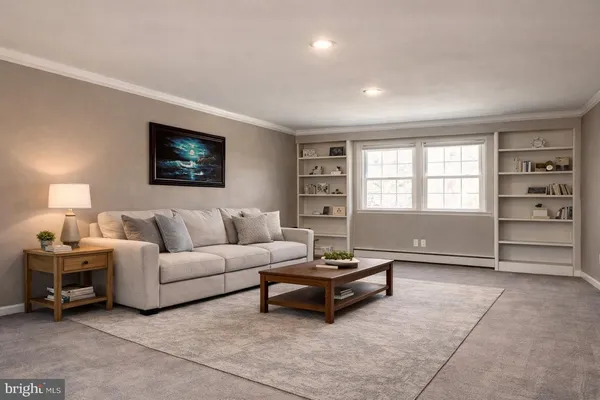 an empty room with a empty space and windows