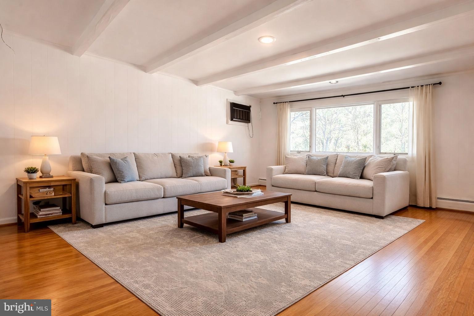 1626 Norristown Road Ambler, PA 19002 - Photo 16 of 57 a living room with furniture and a couch