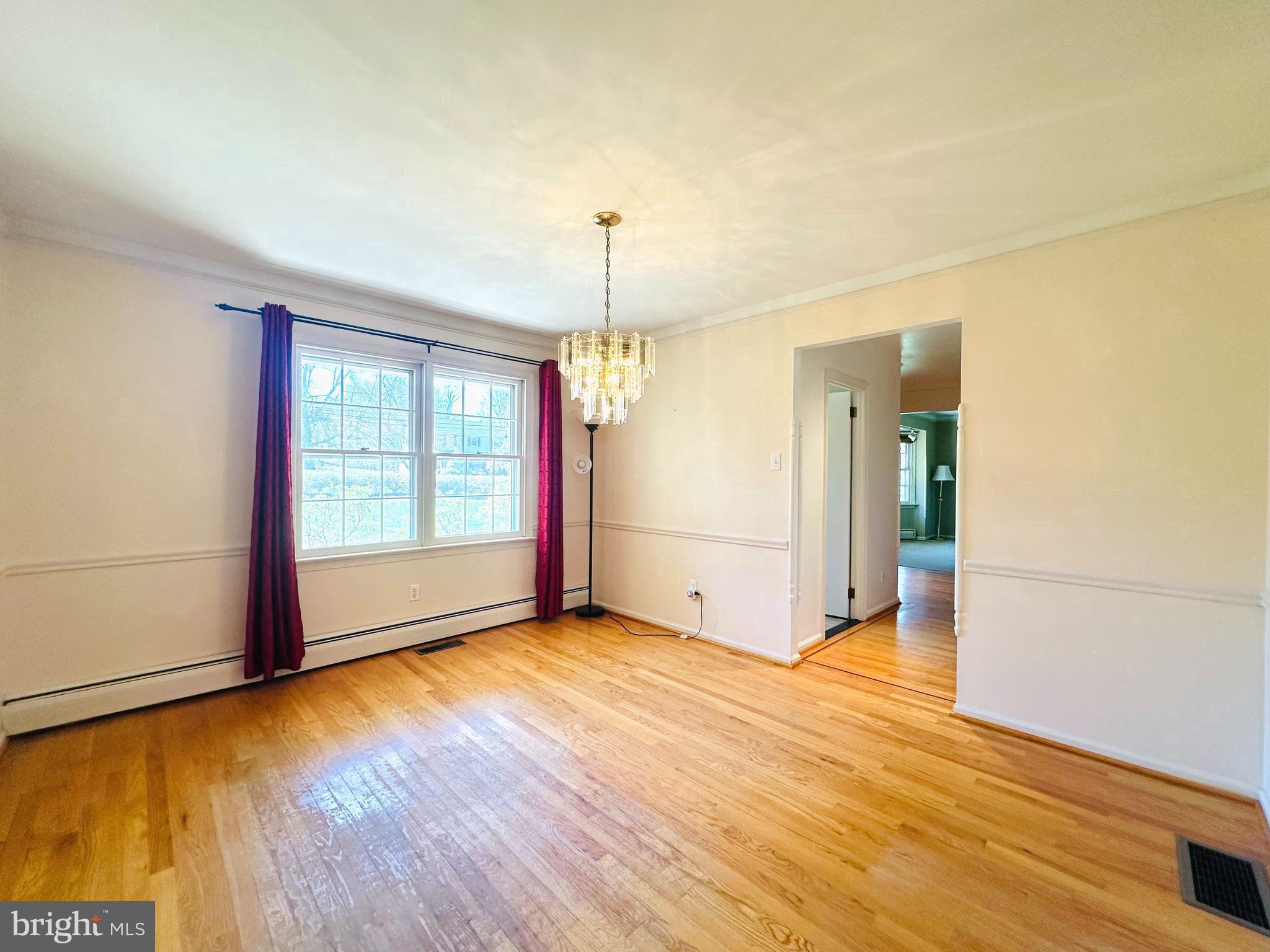 1626 Norristown Road Ambler, PA 19002 - Photo 20 of 57 an empty room with wooden floor and windows