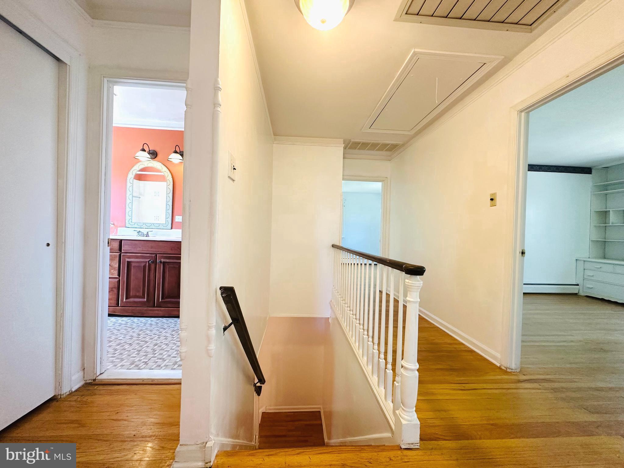 1626 Norristown Road Ambler, PA 19002 - Photo 34 of 57 a view of a hallway with wooden floor and windows
