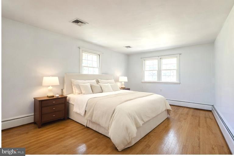 1626 Norristown Road Ambler, PA 19002 - Photo 41 of 57 a bedroom with a bed and a window