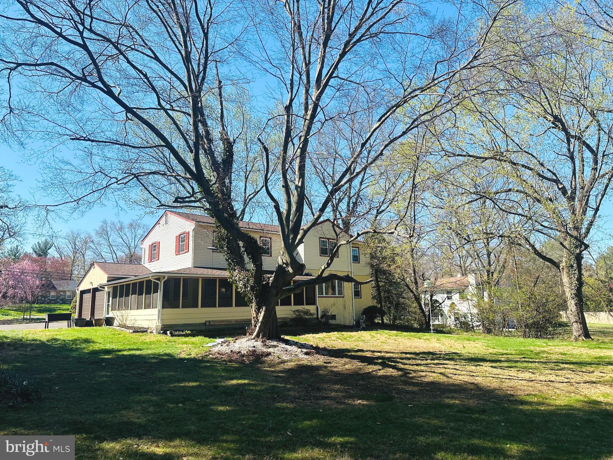 1626 Norristown Road Ambler, PA 19002 - Photo 7 of 57 a front view of a house with a yard