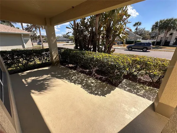 a view of a backyard of the house