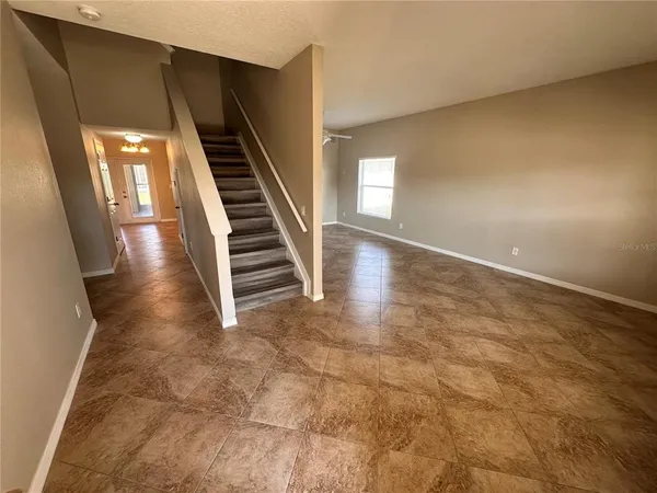 a view of an entryway with stairs