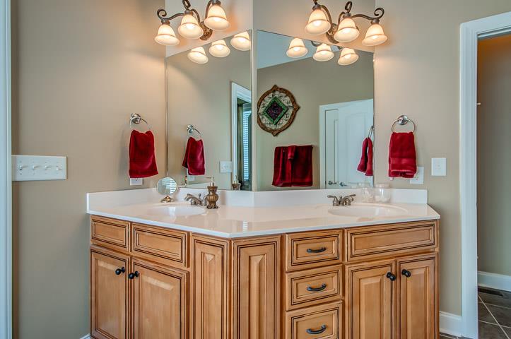 1227 White Rock Road Spring Hill, TN 37174 - Photo 17 of 29 a bathroom with a sink vanity and a mirror