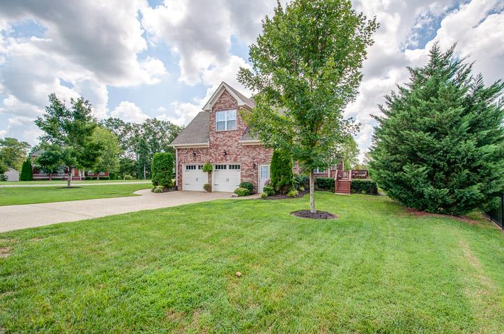 1227 White Rock Road Spring Hill, TN 37174 - Photo 26 of 29 a front view of a house with garden