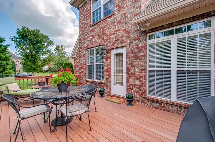 1227 White Rock Road Spring Hill, TN 37174 - Photo 28 of 29 a backyard of a house with seating space