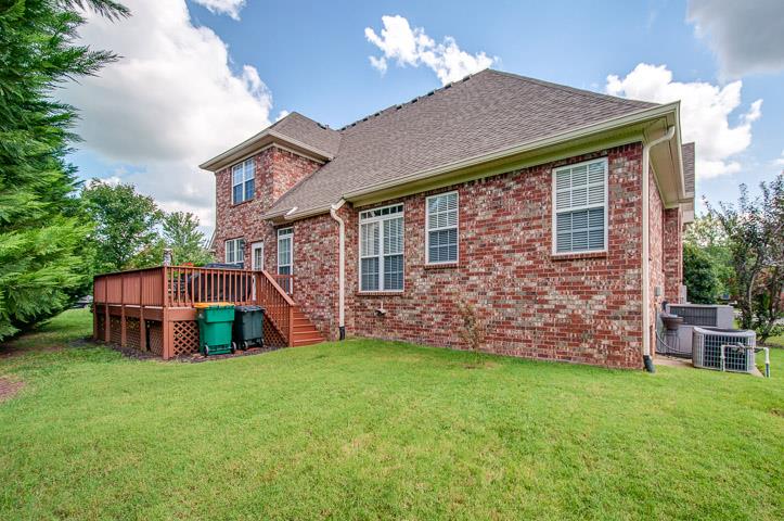 1227 White Rock Road Spring Hill, TN 37174 - Photo 29 of 29 a backyard of a house with lots of green space