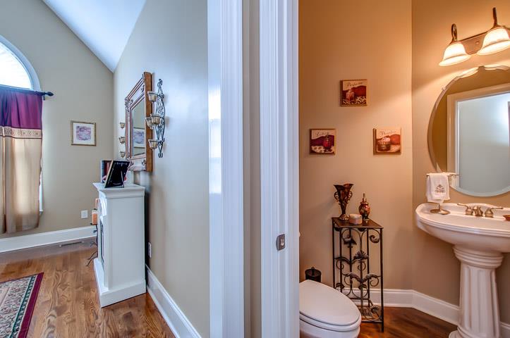 1227 White Rock Road Spring Hill, TN 37174 - Photo 6 of 29 a bathroom with a sink toilet and shower