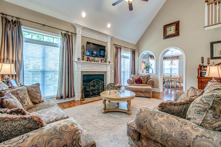 1227 White Rock Road Spring Hill, TN 37174 - Photo 8 of 29 a living room with furniture and a fireplace