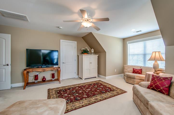 1227 White Rock Road Spring Hill, TN 37174 - Photo 10 of 29 a living room with furniture and a flat screen tv