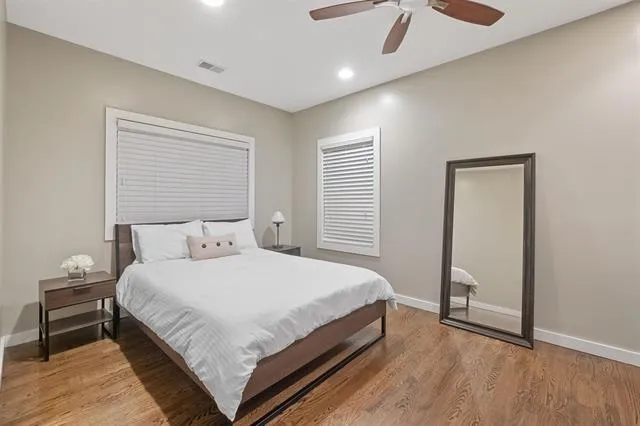 a bedroom with a bed and a walk in closet