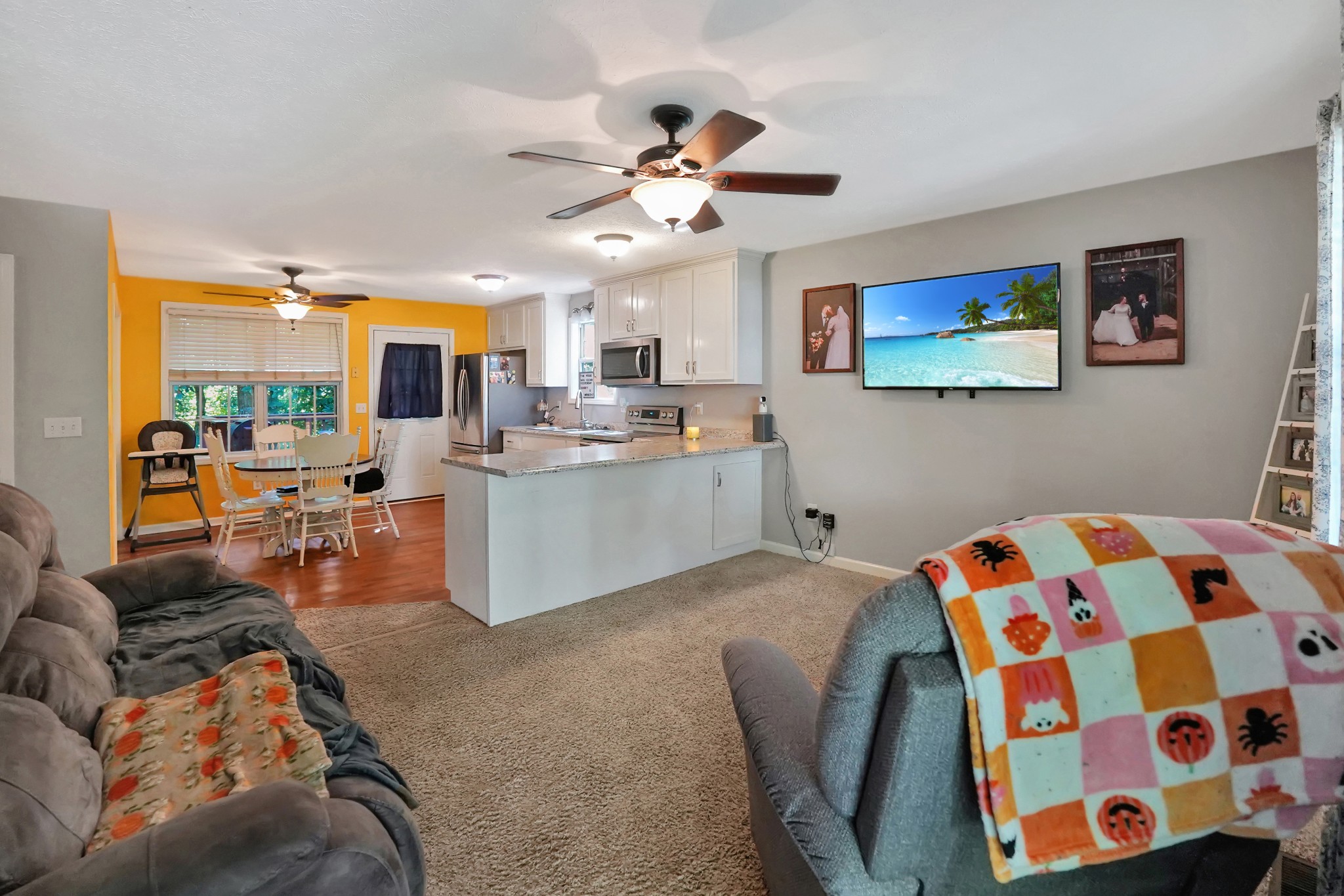 129 Beech Street Dover, TN 37058 - Photo 4 of 27 a living room with furniture and a flat screen tv