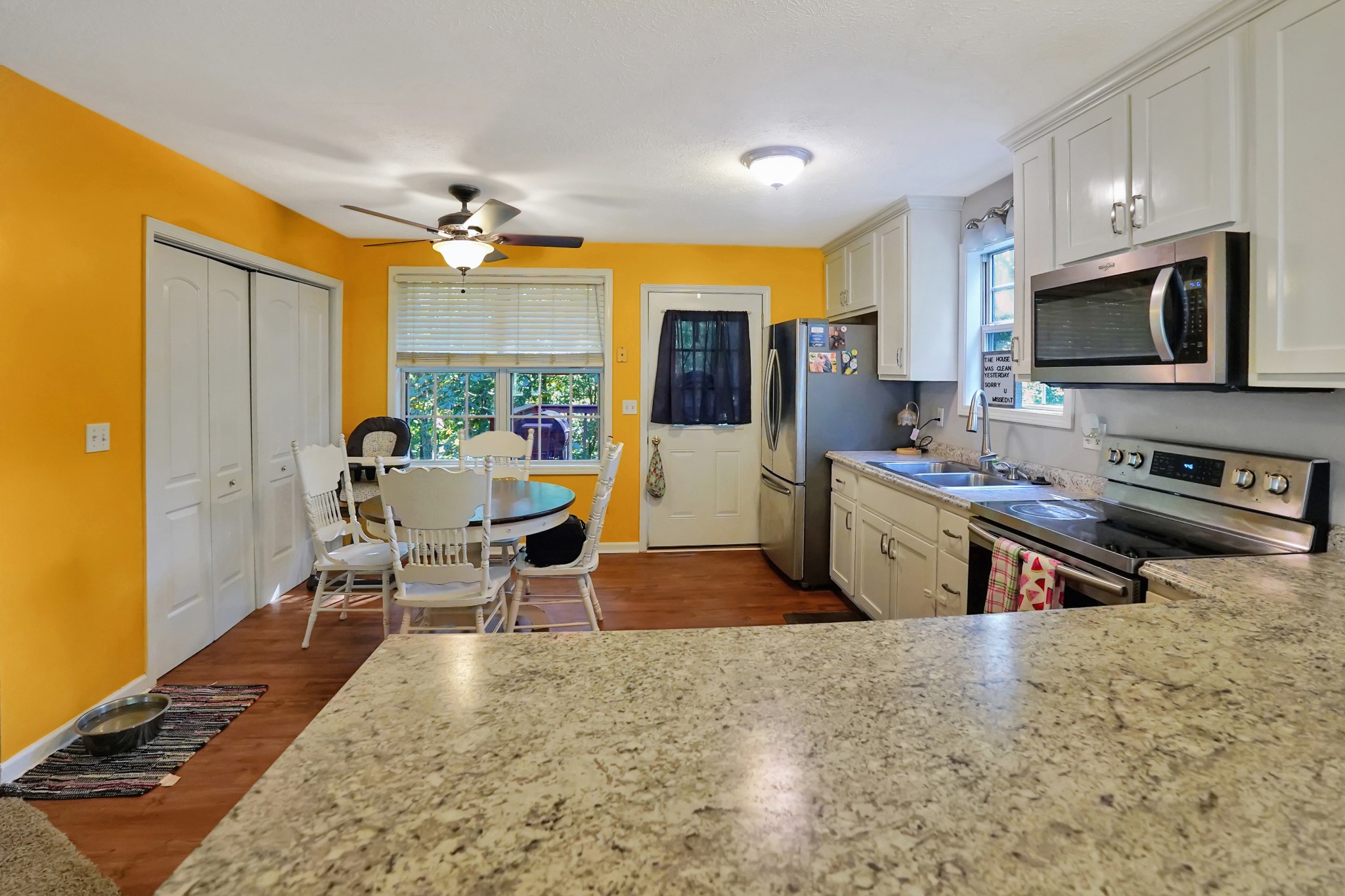 129 Beech Street Dover, TN 37058 - Photo 8 of 27 a living room with stainless steel appliances furniture fireplace and flat screen tv