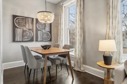 a view of a table and chairs in a room