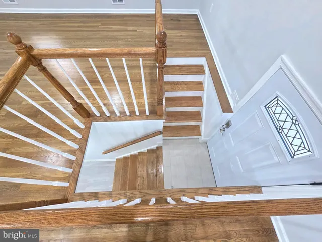 a view of entryway with wooden floor