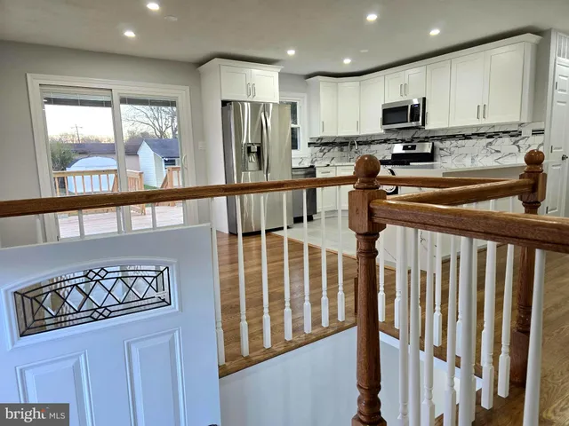 a view of entryway with a front door