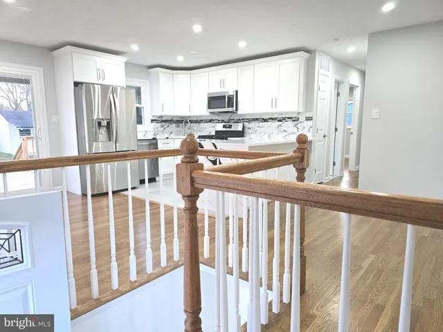 a bathroom with a toilet sink and shower