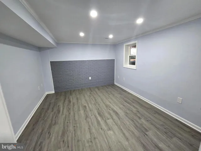 a view of kitchen with wooden floor