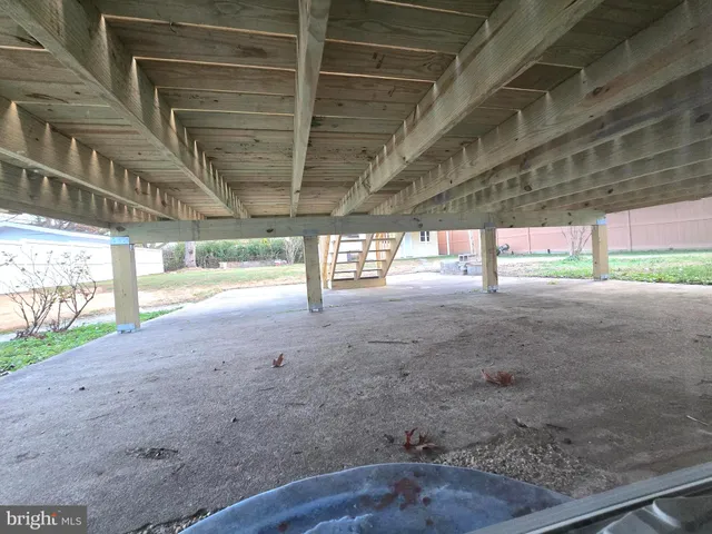 a close view of a utility room with dryer and washer