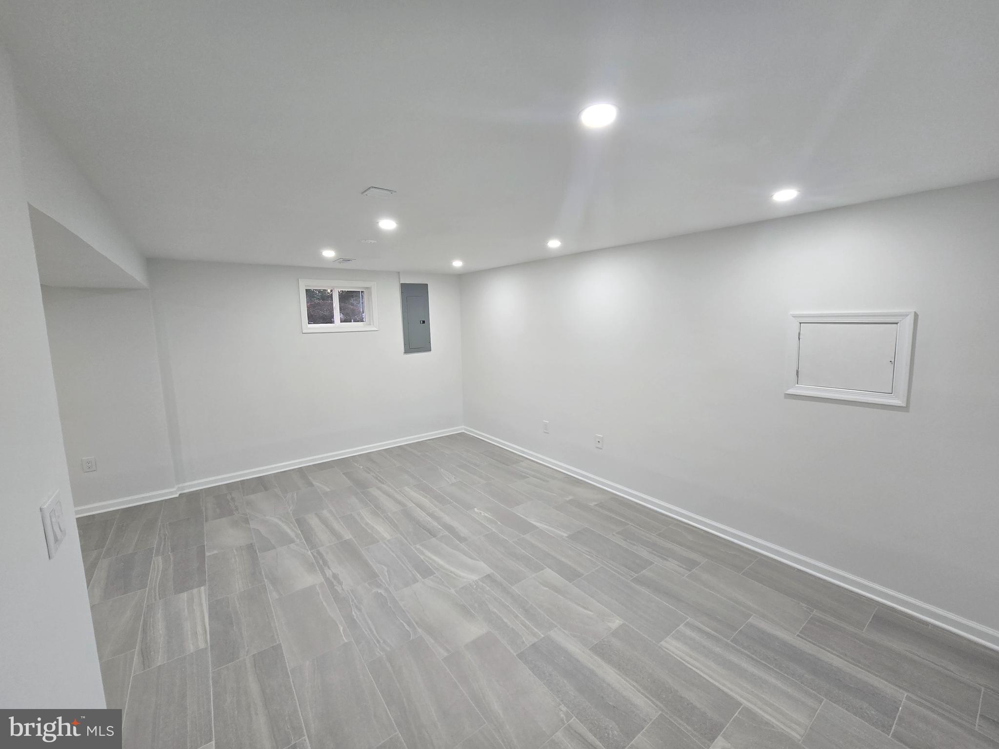 4813 Lawrence Street Alexandria, VA 22309 - Photo 37 of 66 an empty room with a empty space and window