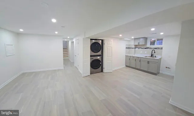 a view of kitchen with wooden floor