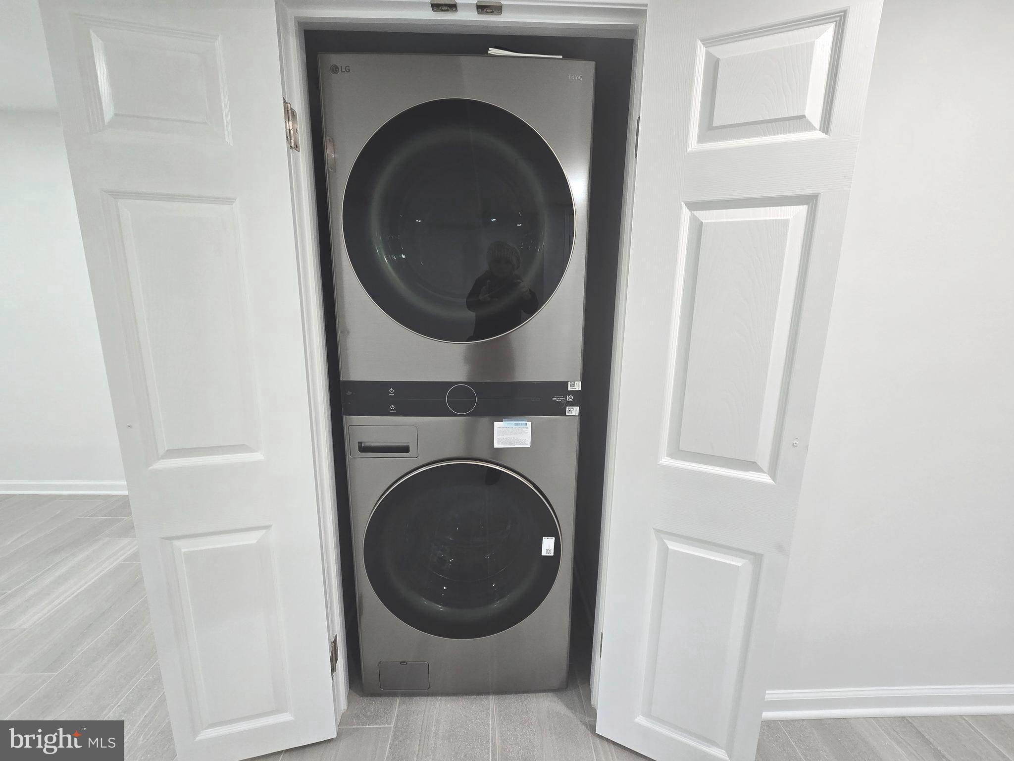 4813 Lawrence Street Alexandria, VA 22309 - Photo 41 of 66 a close view of a utility room with dryer and washer