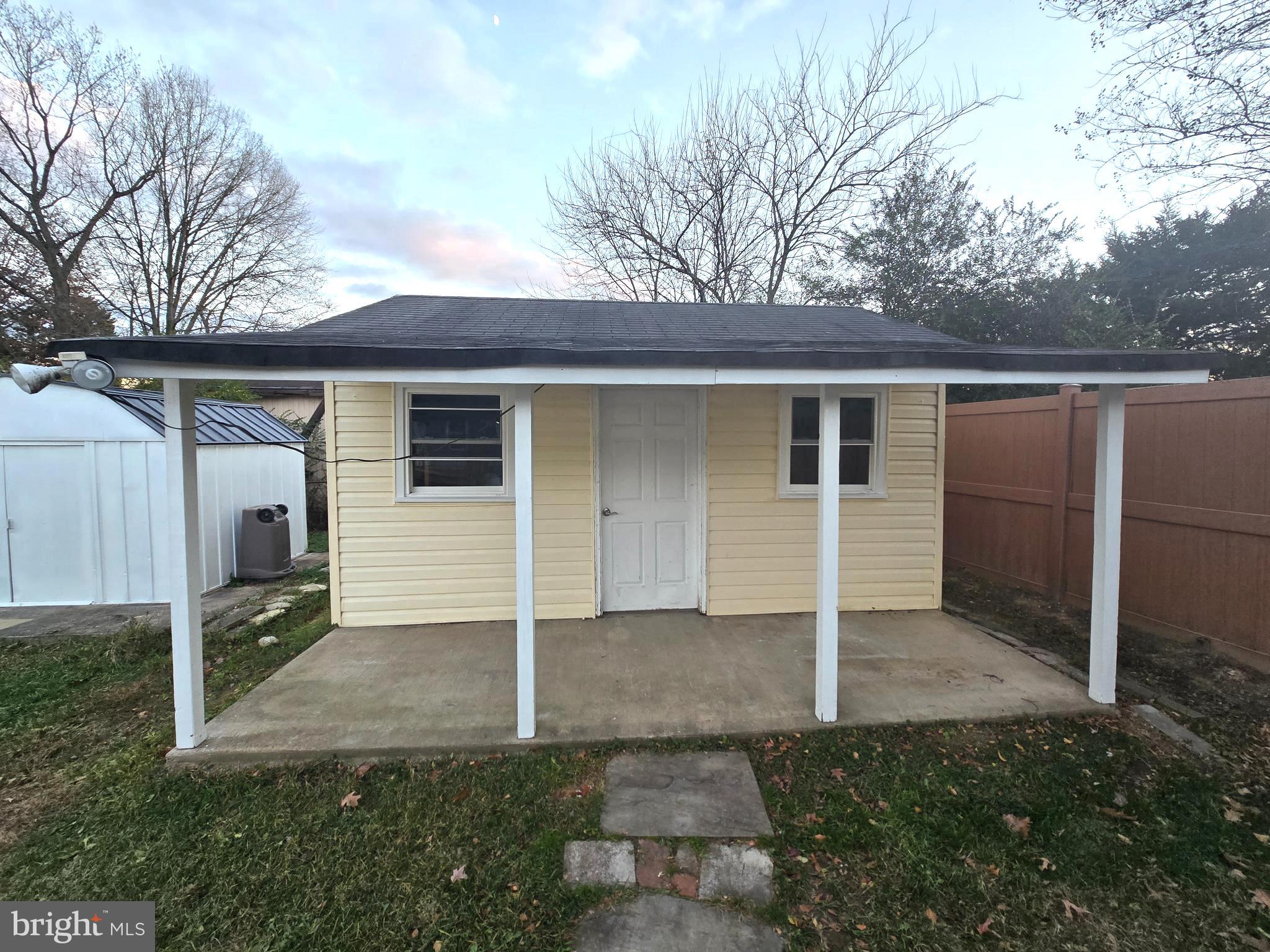 4813 Lawrence Street Alexandria, VA 22309 - Photo 53 of 66 a front view of a house with yard
