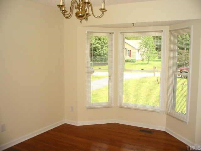 4316 Rockside Hills Drive Raleigh, NC 27603 - Photo 4 of 10 Bright dining room with bay window & hardwood floor Other