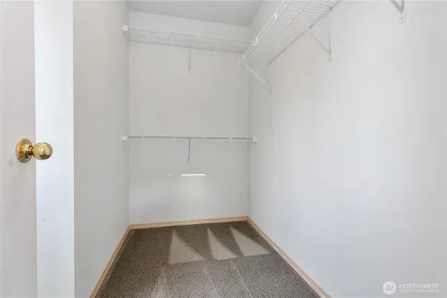 a view of room with racks on the wall