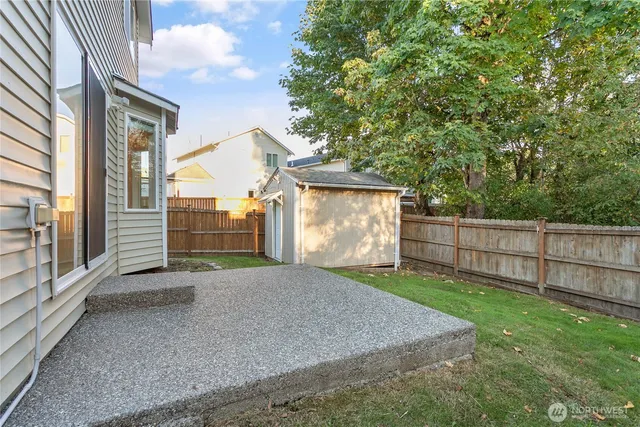 a view of backyard with green space