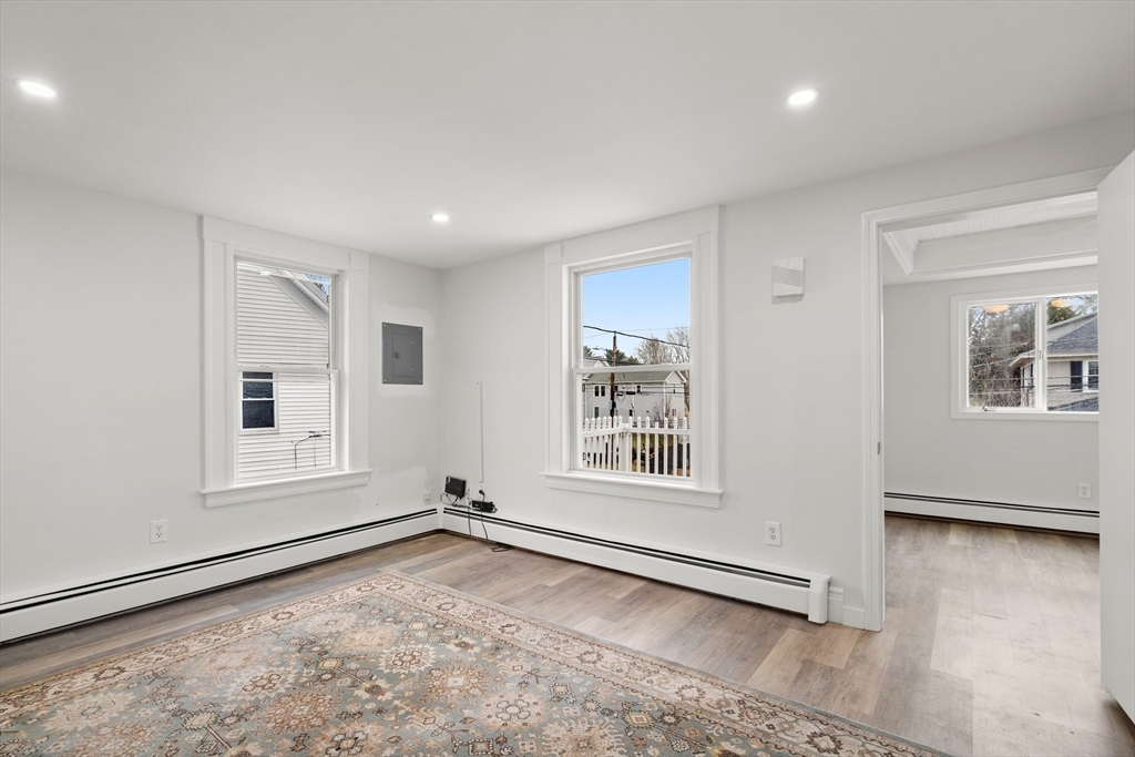 17 3rd Street, Unit 17 North Andover, MA 01845 - Photo 8 of 12 an empty room with windows