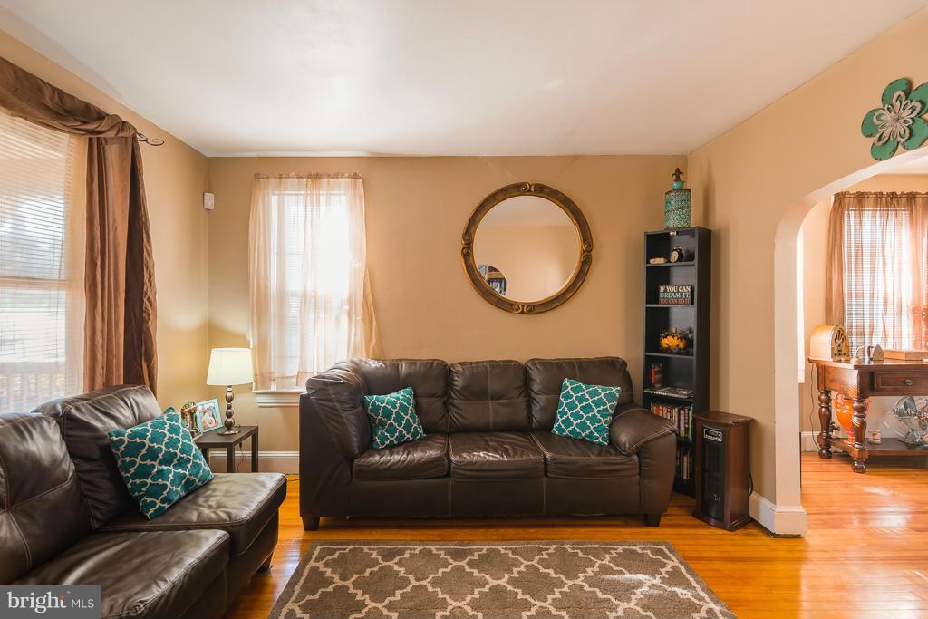 5014 Morello Road Baltimore, MD 21214 - Photo 12 of 29 a living room with furniture and a large window