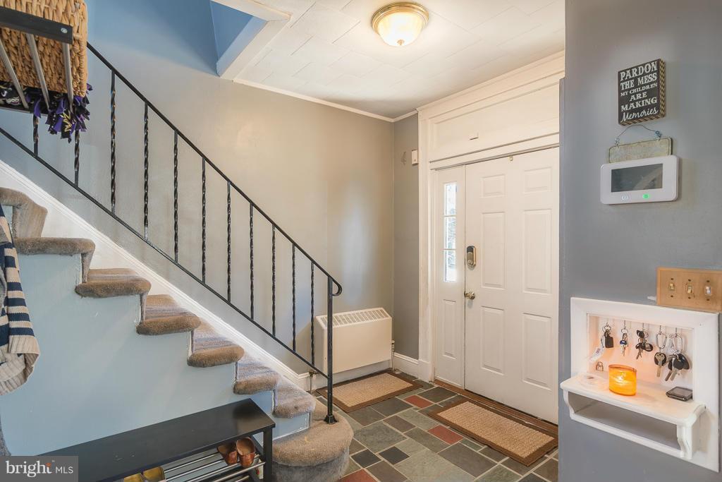 5014 Morello Road Baltimore, MD 21214 - Photo 14 of 29 a view of entryway with stairs and wooden floor