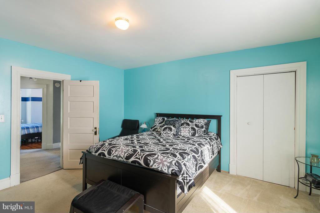 5014 Morello Road Baltimore, MD 21214 - Photo 15 of 29 a bedroom with a bed and a window