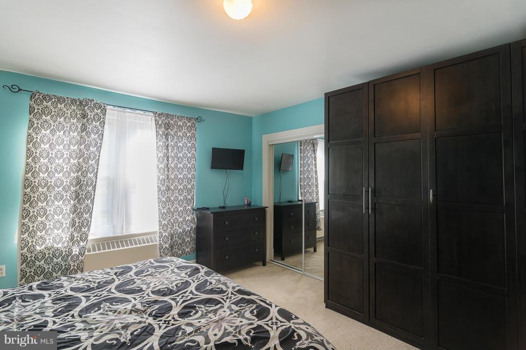 5014 Morello Road Baltimore, MD 21214 - Photo 16 of 29 a bedroom with a bed and a window