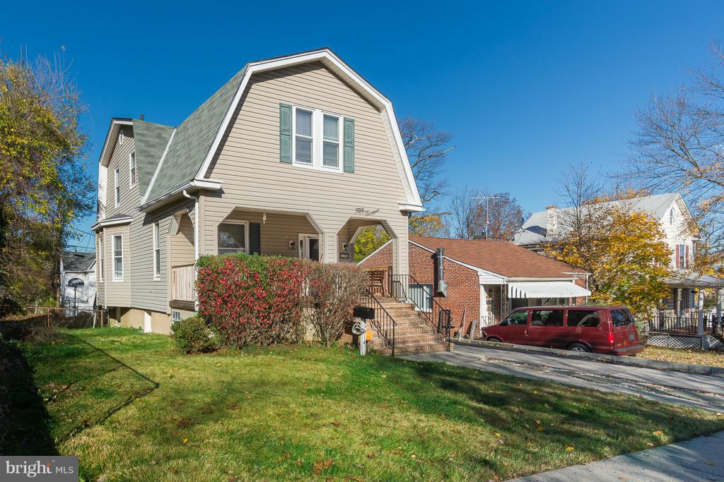 5014 Morello Road Baltimore, MD 21214 - Photo 28 of 29 a front view of a house with a yard