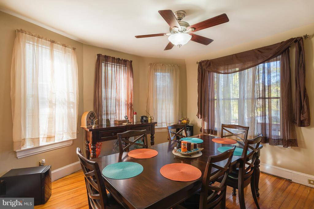 5014 Morello Road Baltimore, MD 21214 - Photo 10 of 29 a view of a dining room with furniture and windows