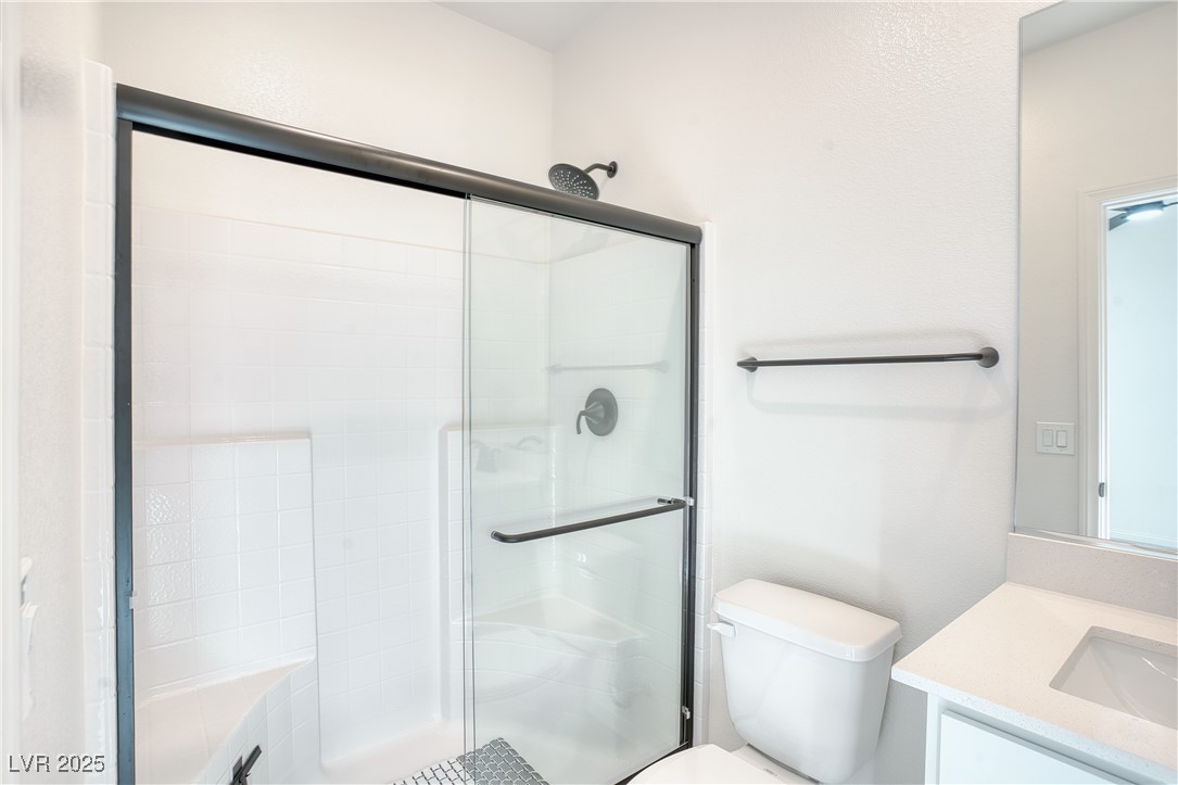 3777 Alla Rocca Avenue Henderson, NV 89044 - Photo 19 of 55 Bathroom with a shower stall and vanity, downstairs