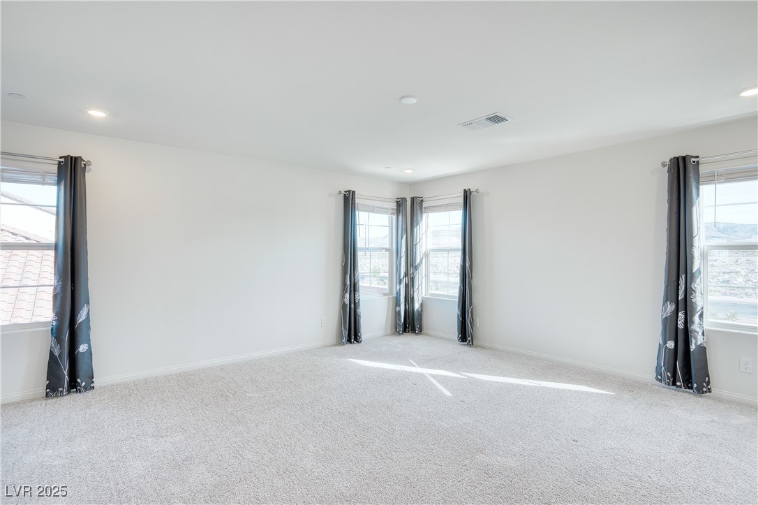 3777 Alla Rocca Avenue Henderson, NV 89044 - Photo 22 of 55 Unfurnished room featuring healthy amount of natural light, carpet, and recessed lighting, upstairs