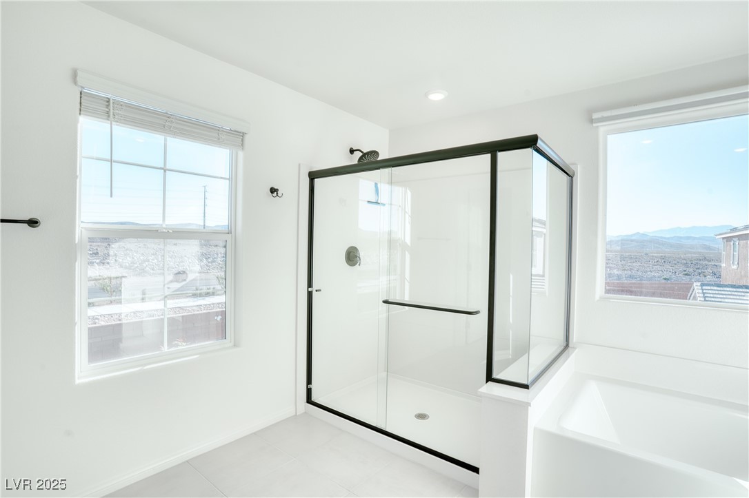3777 Alla Rocca Avenue Henderson, NV 89044 - Photo 26 of 55 Full bath featuring a shower stall, a garden tub, and tile patterned flooring