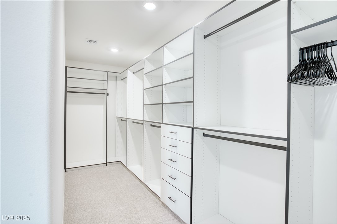 3777 Alla Rocca Avenue Henderson, NV 89044 - Photo 28 of 55 Spacious walk-in closet with light colored carpet
