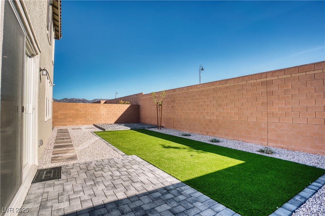 3777 Alla Rocca Avenue Henderson, NV 89044 - Photo 40 of 55 Fenced backyard featuring a patio area