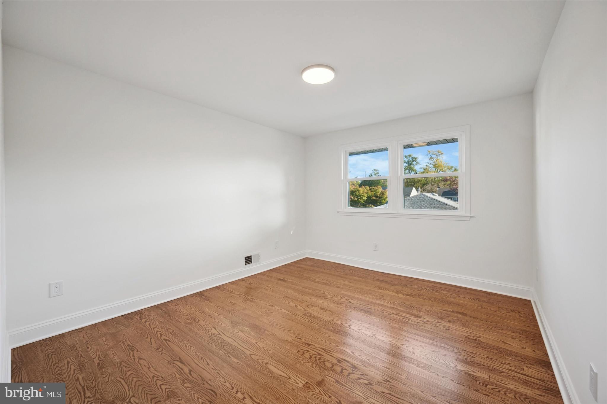 2308 Poplar Road Havertown, PA 19083 - Photo 17 of 25 an empty room with windows