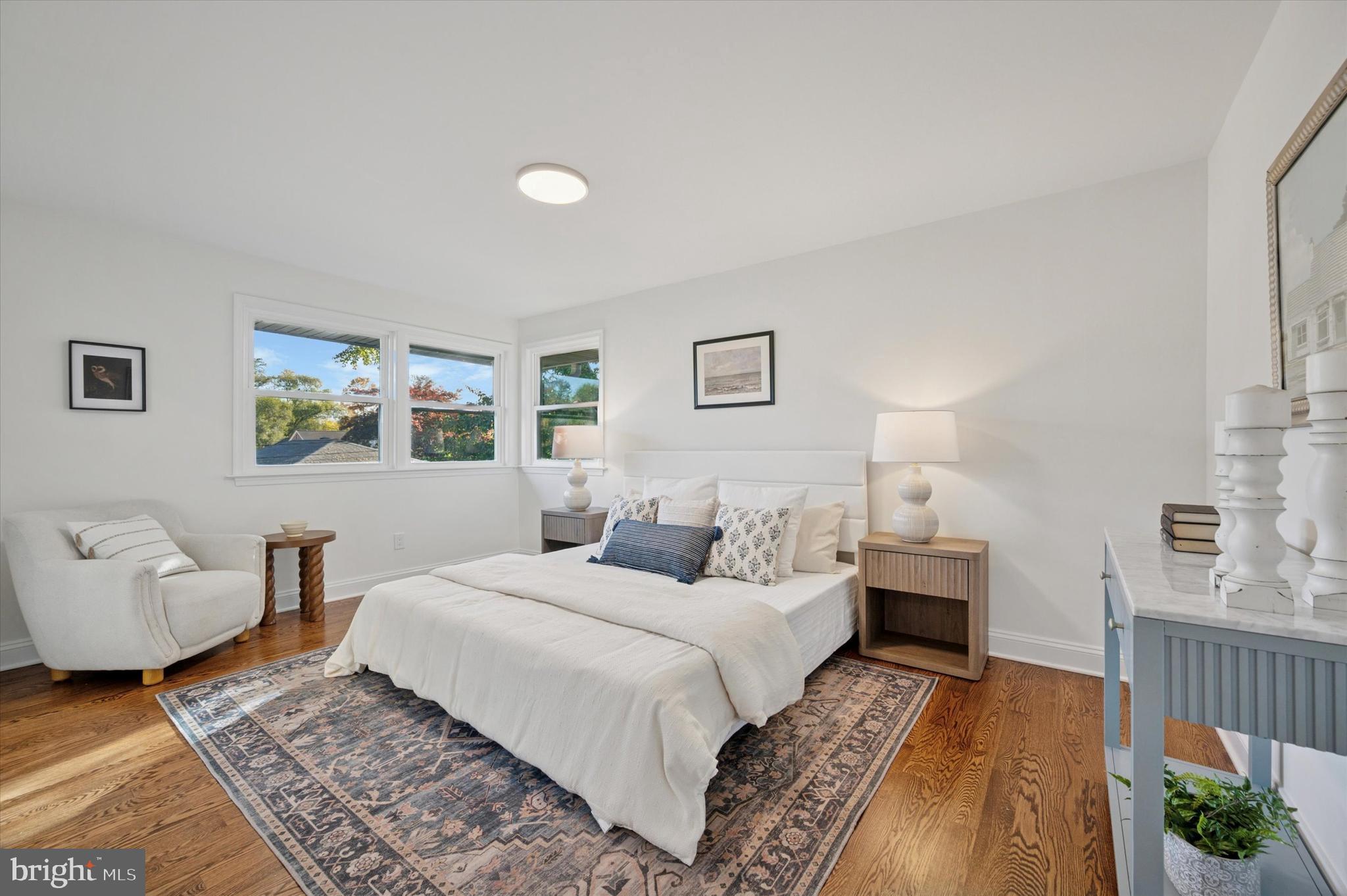 2308 Poplar Road Havertown, PA 19083 - Photo 22 of 25 a bedroom with a bed and a couch