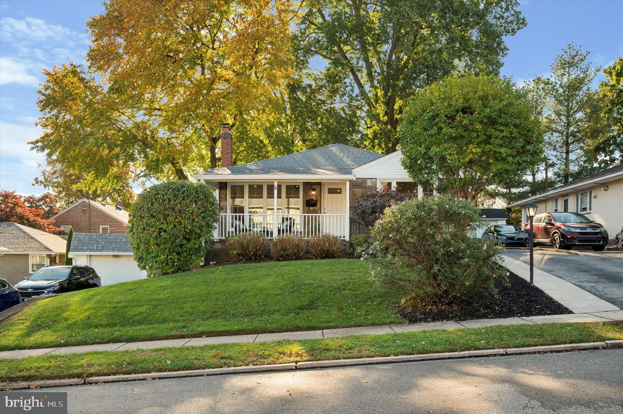 2308 Poplar Road Havertown, PA 19083 - Photo 3 of 25 a front view of a house with a yard