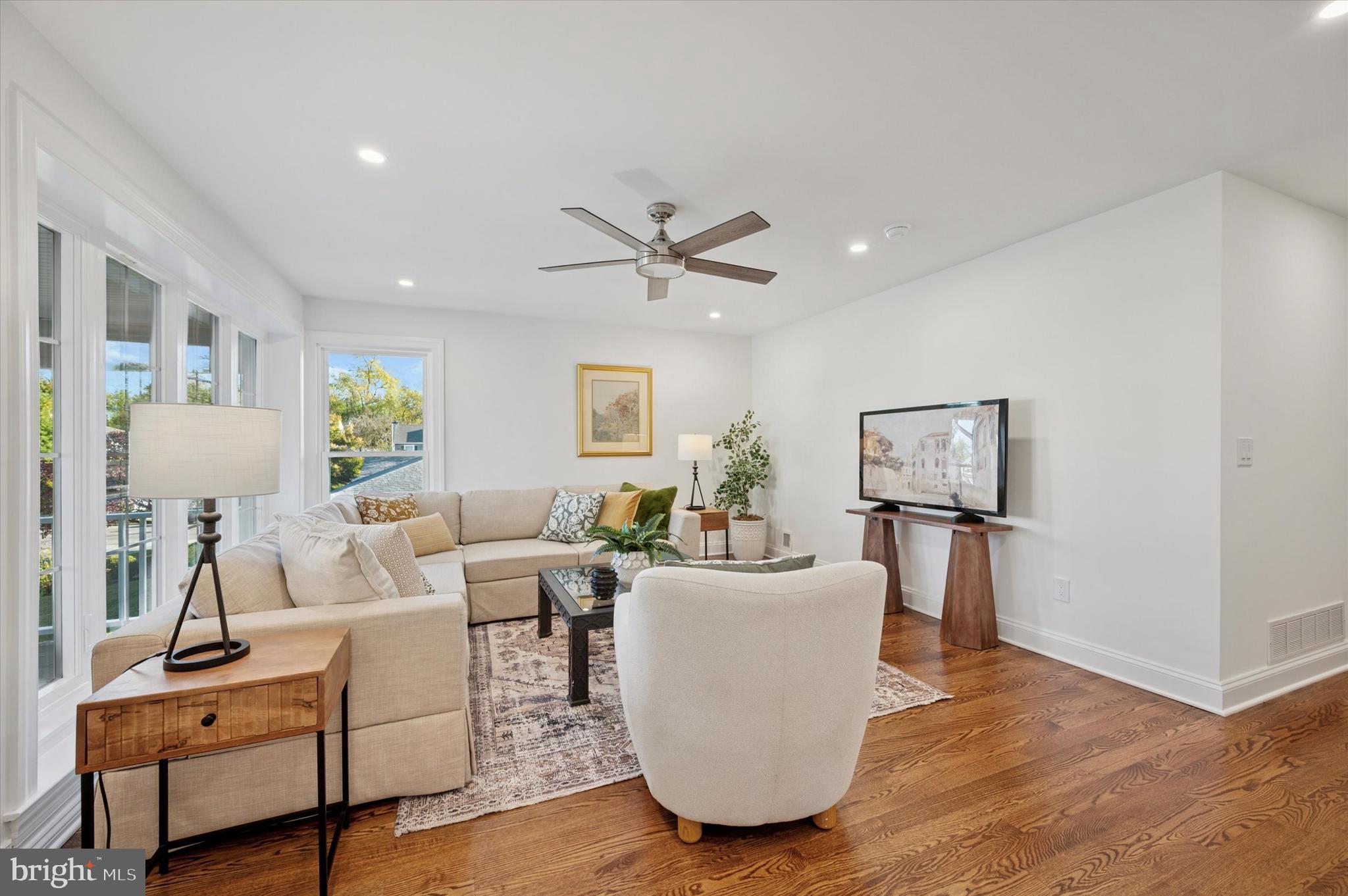 2308 Poplar Road Havertown, PA 19083 - Photo 6 of 25 a living room with furniture a rug and a ceiling fan