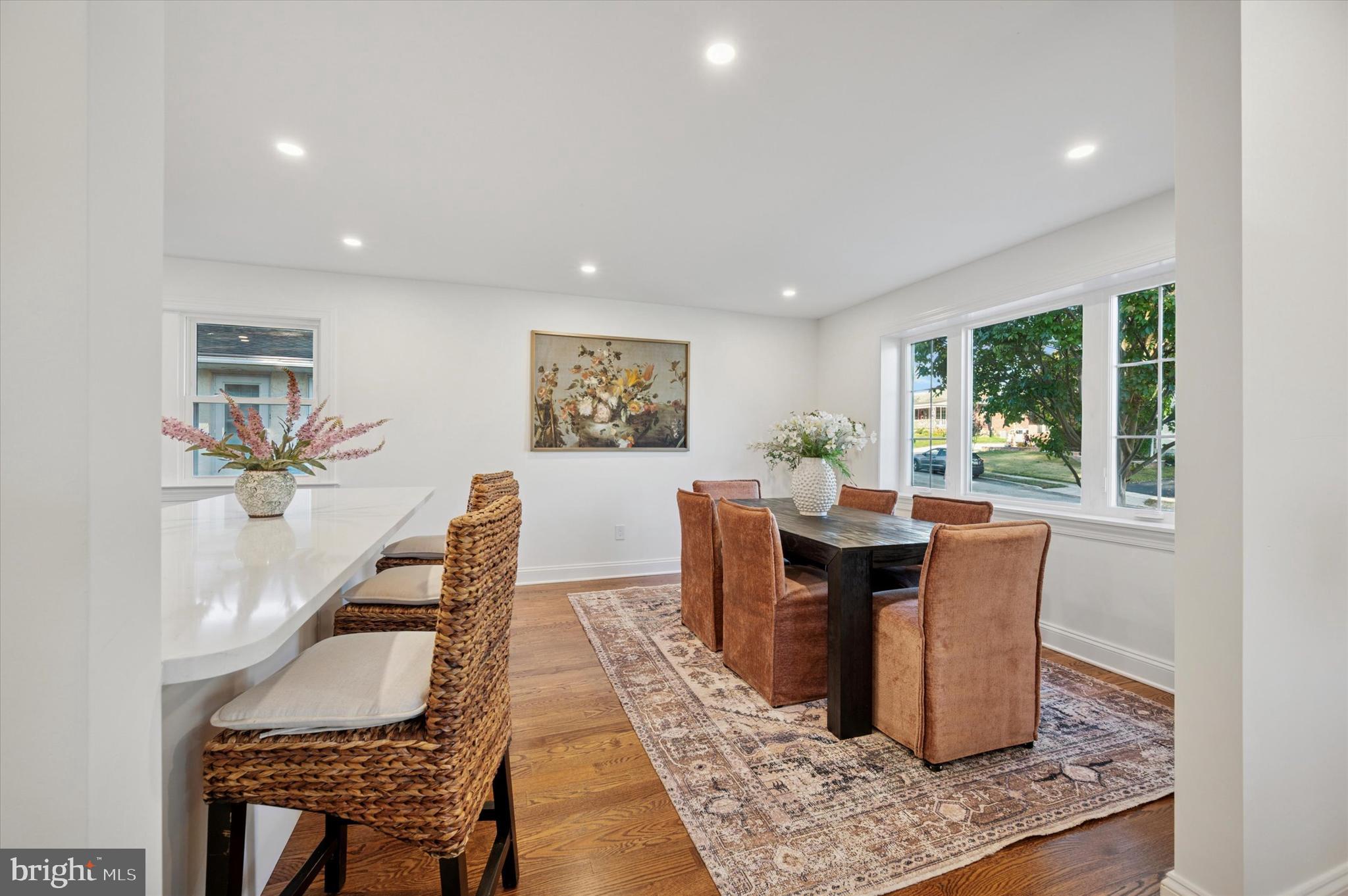 2308 Poplar Road Havertown, PA 19083 - Photo 9 of 25 a dining room with furniture a window and wooden floor